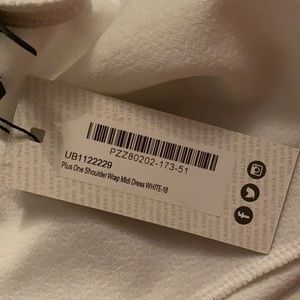 White cold shoulder dress